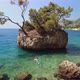 Woman Swimming in Punta Rata Beach of Croatia - VideoHive Item for Sale