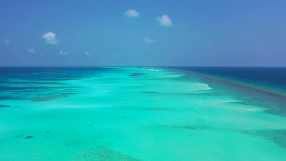 Tropical birds eye abstract view of a summer white paradise sand beach and blue sea background in co