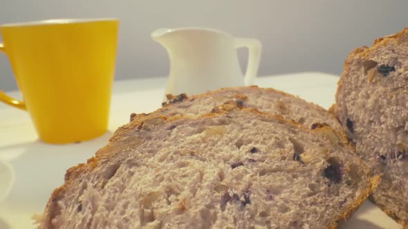 Sliced Rye Raisin Bread to the Whole Dinner Table