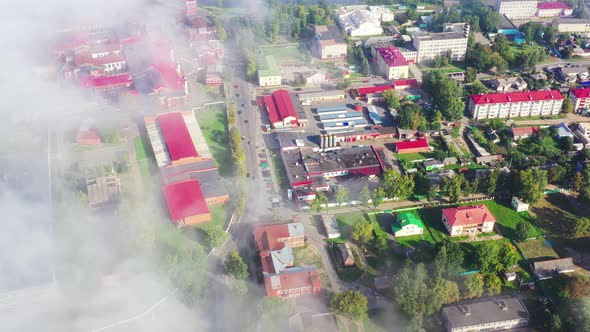 View of the City From a Height That Covers the Morning Summer Fog