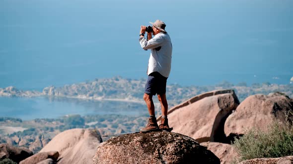 Tourist Photographing the Landscape