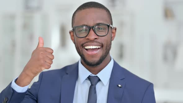 Portrait of Attractive African Businessman Showing Thumbs UP