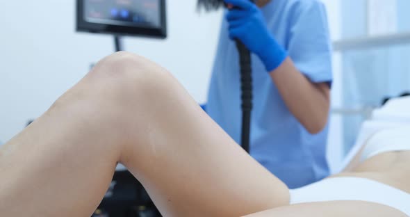 Woman Undergoes Laser Hair Removal Procedure in Beauty Salon Closeup