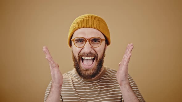 Midlife Man Looks Around and Shows Happiness Closeup