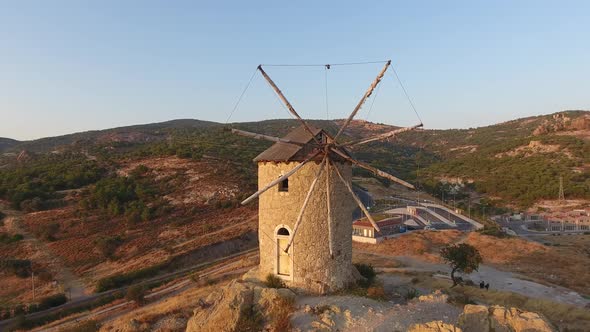 Old Traditional Historic Stone Windmill at the Sunset