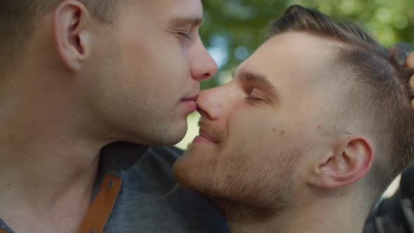 Portrait of Gay Couple Expressing Feelings Outdoor