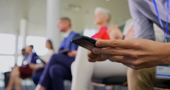 Businessman using mobile phone in the business seminar 4k