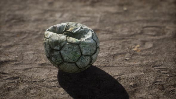 Old Soccer Ball the Cement Floor alt