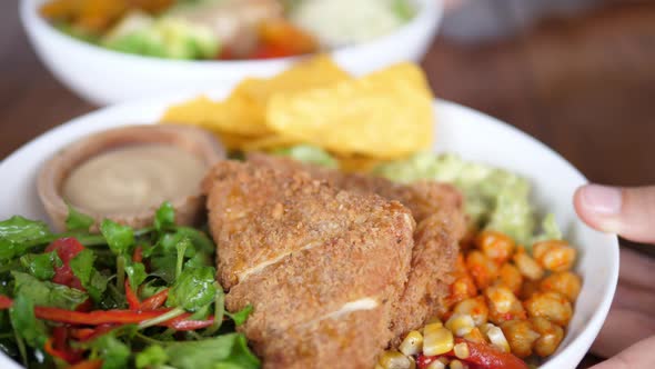 Close Up of Serving Plates with Balanced Nutritious Vegan Meals Full of Vegetables Greens and Plant