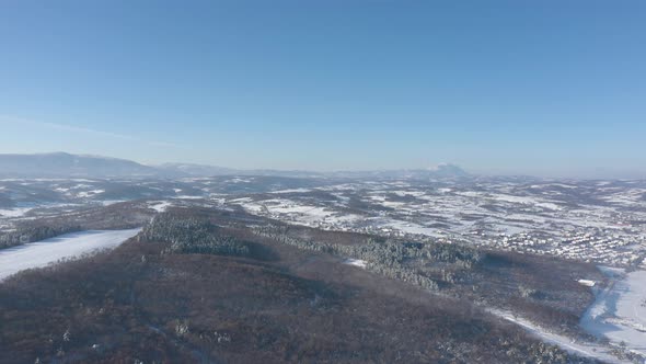 Valley with Rtanj mountain by winter 4K drone video