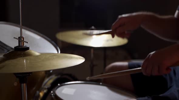 Professional Drummer Playing on Drum Set