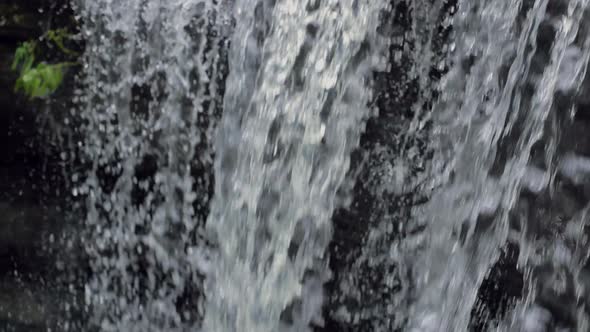 Detail of Water in a Waterfall Flowing in Slow Motion