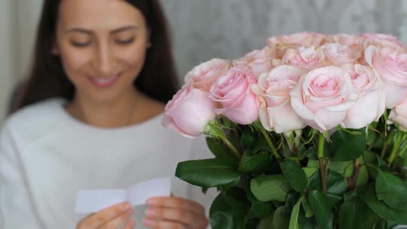 Woman Receive Flowers with Message