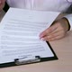 Young Business Woman Read and Signing Contract - VideoHive Item for Sale