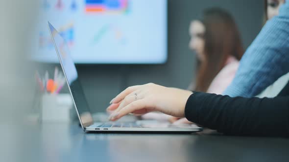 Woman's Hands Are Typing Keyboard