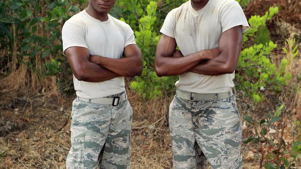 Fit men standing at boot camp