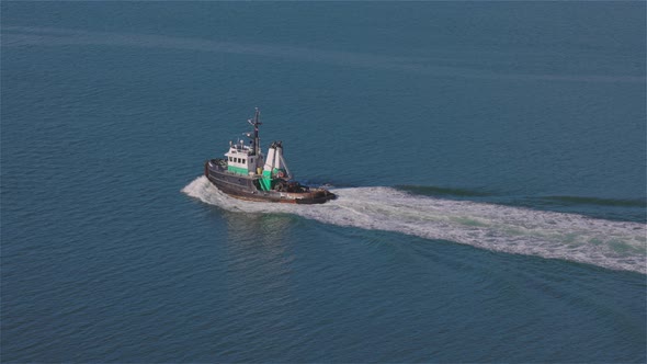 Industrial Tugboat Pulling a Load in Burrard Inlet