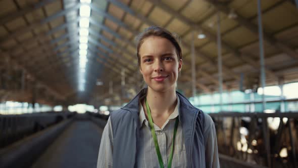 Smiling Woman Posing Shed Aisle Alone Portrait