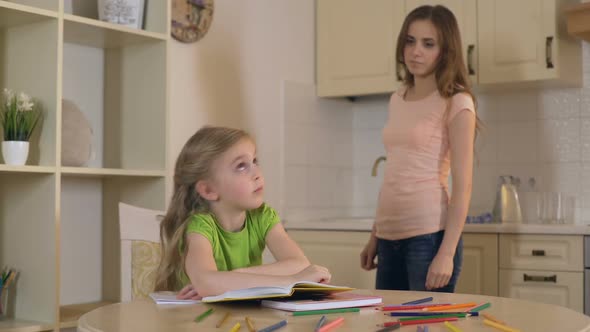 Unhappy Little Girl Refusing to Read Book, Suffering Hyperactivity Disorder