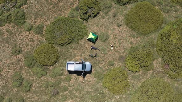 Camper Coming To The Top Of The Mountain With An Offroad Vehicle