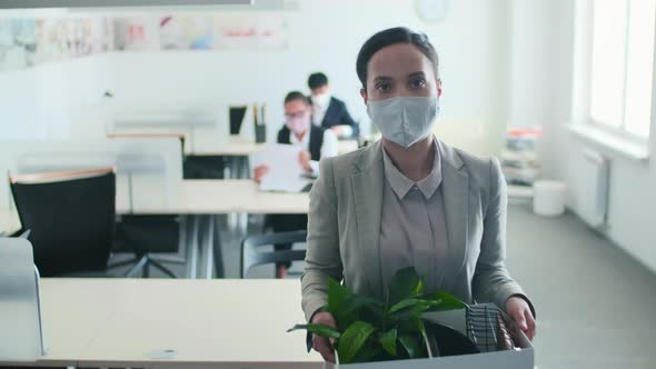Businesswoman Wearing Mask In Office