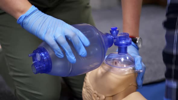 Cardiopulmonary resuscitation. Training demonstration of a chest compression 