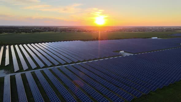 Aerial View of Large Solar Panels at a Solar Farm at Bright Summer Sunset, Solar Cell Power Plants