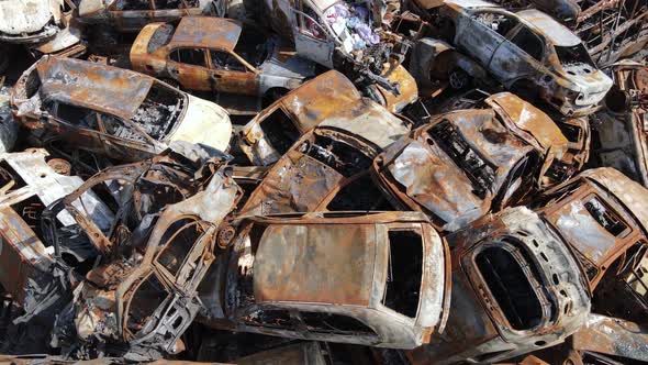 Consequences of the War in Ukraine  a Dump of Shot and Burned Cars in the City of Irpen Near Kyiv