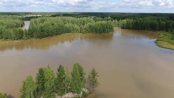 Flight Over the Taiga Forest Lake