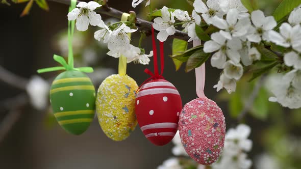 Colorful Easter Eggs on a Flowering Tree