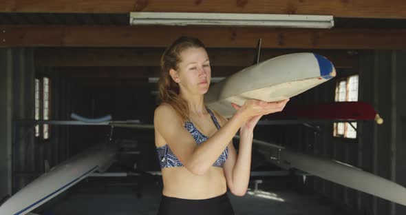 Female rowing team training on a river