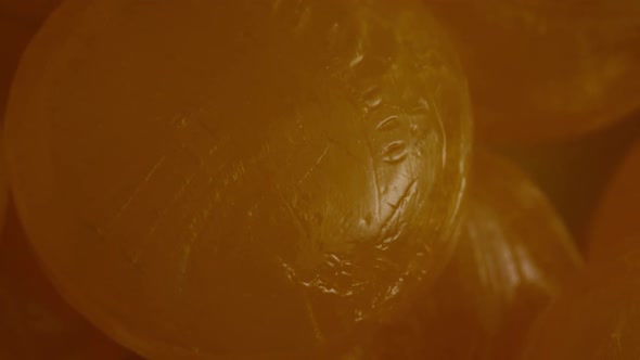 Rotating shot of butterscotch candies - CANDY BUTTERSCOTCH 054