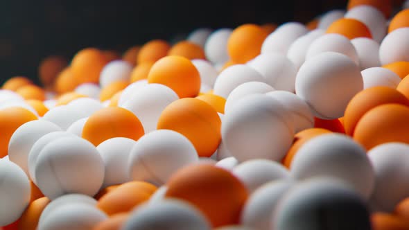 Seamless loop animation of endless supply of ping pong balls. Table tennis balls