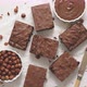 Fresh Homemade Chocolate Brownie Served with Hazelnuts and Melted Cream - VideoHive Item for Sale