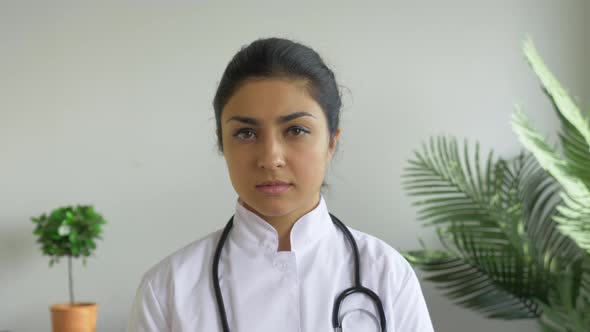 A Portrait Of Woman Doctor Standing In Hospital