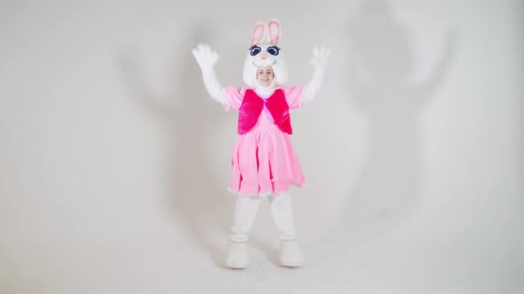 Portrait of a young cute girl in a beautiful hare costume