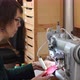  A seamstress on her machine - VideoHive Item for Sale