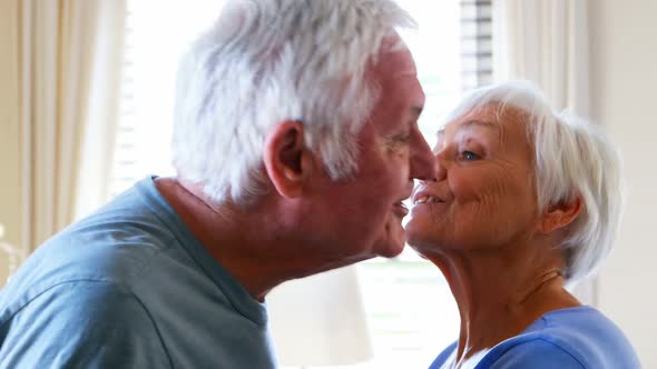 Senior couple kissing and interacting with each other