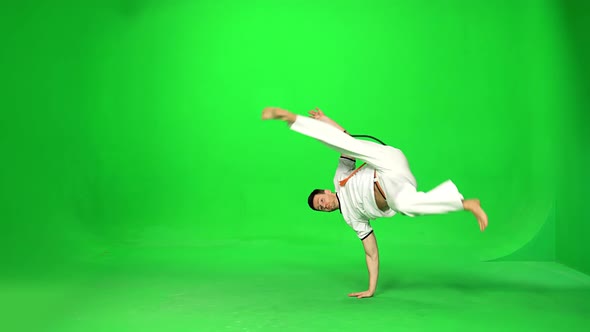 Man Practicing Capoeira on Chroma Key.