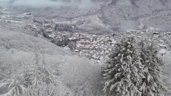 Krasnaya Polyana Village Surrounded By Mountains Covered with Snow