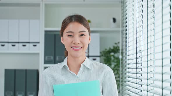 Portrait of Asian young smart businesswoman work in company office. Job application and recruitment