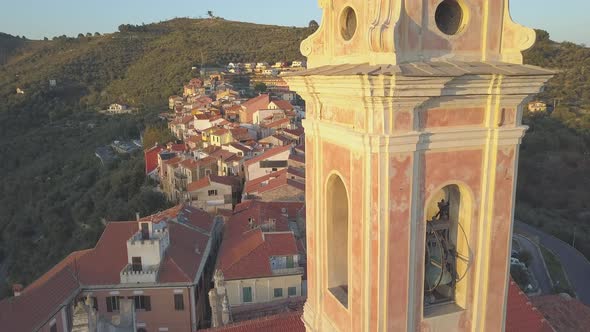 Aerial view on Civezza and San Marco Evangelista church in Liguria, Italy. Mediterranean town villag