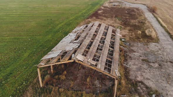 Ruins of an Old Industrial Farm Building for Farm Animals in the Evening