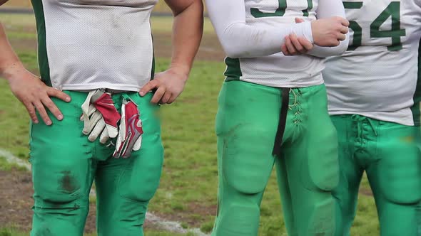 Football Team Players Lined Up After Crucial Match for Traditional Axe Trophy