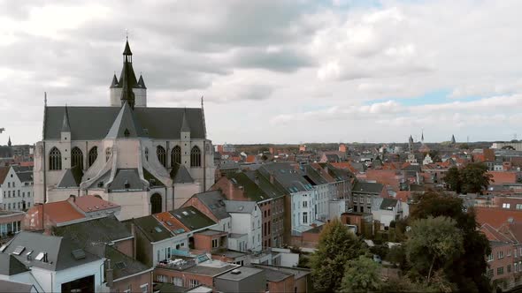 Church of Our Lady across the river Dijle, Mechelen, Belgium.  Aerial forward