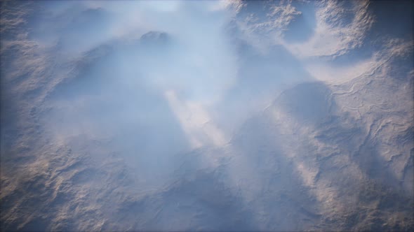 Distant Mountain Range and Thin Layer of Fog on the Valleys