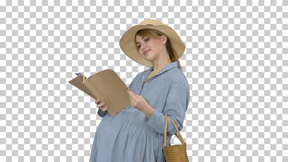 Pregnant woman in a summer hat reading magazine, Alpha Channel