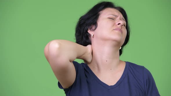 Stressed Woman with Short Hair Having Neck Pain