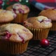 Revers dolly shot with homemade cranberry orange muffins on cooling rack, Christmas decoration - VideoHive Item for Sale