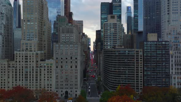 Forwards Fly Into Space Between Tall Buildings Encircling Central Park